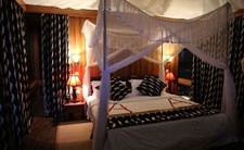 Schlafzimmer mit Moskito Netz AA Lodge Mara